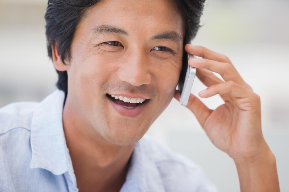customer service smiling taking phone call